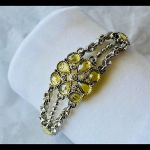 Silver bracelet with yellow and white CZ details